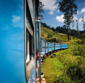 Tiding a train among tea plantations in the country’s highlands.