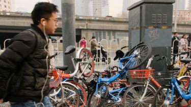 Shared bikes discarded by commuters rushing to work in Beijing's CBD.
 