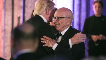 Rupert Murdoch embraces President Trump.