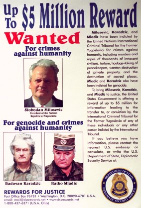 Wanted poster for Yugoslav President Slobodan Milosevic and Bosnian Serb leaders Radovan Karadzic and Ratko Mladic released by the US State Department in 2000.