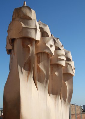 Sculptural chimneys on the rooftop of Gaudi’s first apartment
block, La Pedrera, finished in 1910.