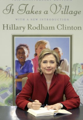 Hillary Clinton signing copies of  her first book <i>It Takes a Village</i> in New York in 2006. 