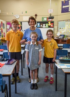 Margaret Hanrahan, who attended St Michael's primary in the 1940s, with three of her grandchildren who are in the school's final student body: (left to right) Billy Hanrahan, Ellie Hanrahan and Tess Rafter.