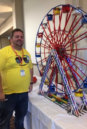 Monash public servant Russell Murphy with his 4000-piece Lego ferris wheel.