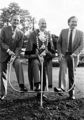 Gordon Dicker (left) helped turn the first sod for the Dougherty aged housing project in 1985 in Sydney. He was joined by Willoughy mayor Noel Reidy and then NSW housing minister Frank Walker.
