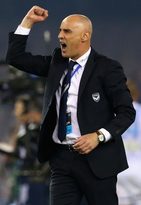 Victory coach Kevin Muscat shows his delight at his side's performance on Friday night.