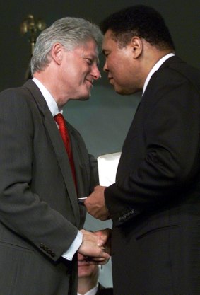 Long-time friends: President Bill Clinton gives Muhammad Ali the Presidential Citizens Medal award on January 8, 2001 at the White House.