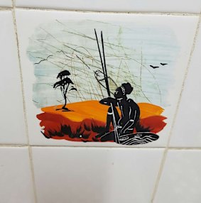 One of the tiles beside the men's urinal in the Sussex Inlet RSL that has upset ACT Labor's Bec Cody.