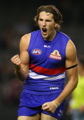 Marcus Bontempelli celebrates during The Bulldogs' round one win over West Coast Eagles. 