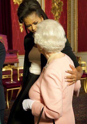 A familiar touch: Michelle Obama  and Queen Elizabeth II.