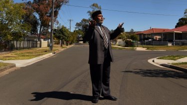 Australian citizen and MP in the breakaway Republic of Somaliland, Ibrahim Ahmed Reigal stands in his neighourhood in Sadlier, Sydney.