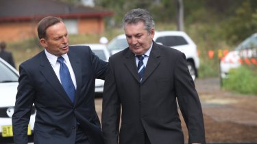 Former Macarthur MP Russell Matheson (right) is pictured with Tony Abbott. 