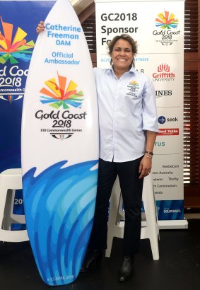 Cathy Freeman with her new surfboard.