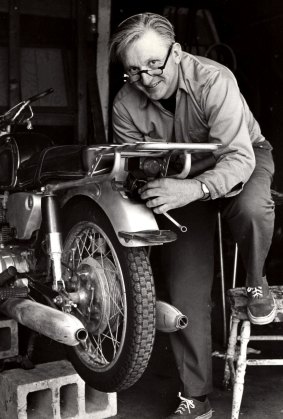 Robert M. Pirsig working on a motorcycle, 1975.  