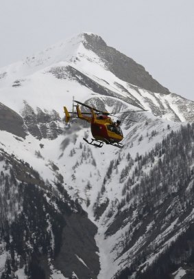 Recovery crews, doctors and investigators must be lowered onto the mountainside by cables from helicopters.