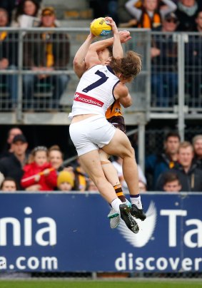 Nat Fyfe of the Dockers and Taylor Duryea of the Hawks collide on Sunday.