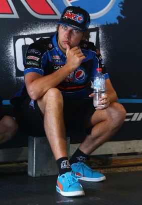 Time out: Chaz Mostert takes a break during practice for the Gold Coast 600.