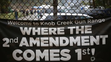 A banner in support of the right to bear arms is displayed at last month's Knob Creek Machine Gun Shoot, one of the largest gun shows in the world.