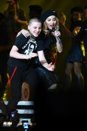 Rocco Ritchie and Madonna perform on stage during her "MDNA" tour at Ramat Gan Stadium on May 31, 2012 in Tel Aviv, Israel.