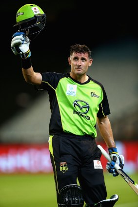 Goodbye, Mr Cricket:  Michael Hussey of the Thunder walks off the field to begin his retirement from the game.