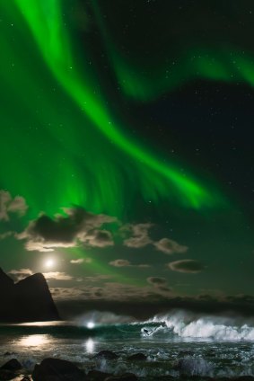 Northern exposure: Mick Fanning surfs under the aurora borealis in Norway, 2016.