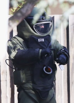 An explosives device detector outside the scene of the Brighton siege in Melbourne.