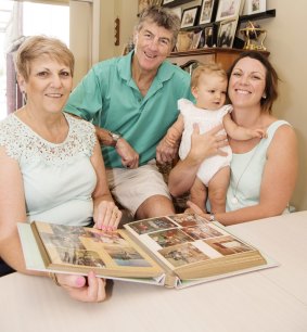 Jacqueline Pidd with her daughter and parents, Bronwyn and Phil Newman, at home. 