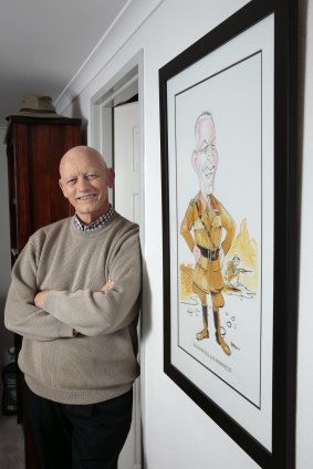Legacy Canberra president Bill Rolfe pictured at home in Nicholls with a cartoon of him drawn by cartoonist Warren Brown that was gifted to him when he retired from the Repatriation Commission.    