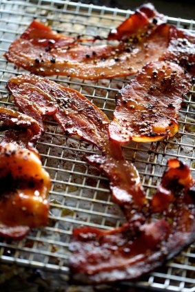 Delicious bacon let police to two men who stole pork products.