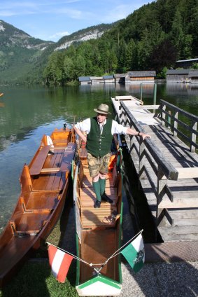 Float on by: Heinz, the lederhosen and the Traditional flat-bottomed boats on the Altaussee Lake. 