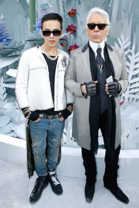 G-Dragon and fashion designer Karl Lagerfeld after the Chanel show at  Paris Fashion Week earlier this year.  