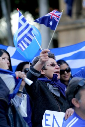 Members of the Australian-Greek community rally in Brisbane in support of their homeland.