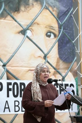 Diana Abdel-Rahman speaking at the Stand Up for Refugees rally at Garema Place in Civic. 