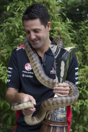 V8 Supercars champion Jamie Whincup at a pre-season promotion at Sydney's Taronga Zoo on Thursday moments before he was bitten.