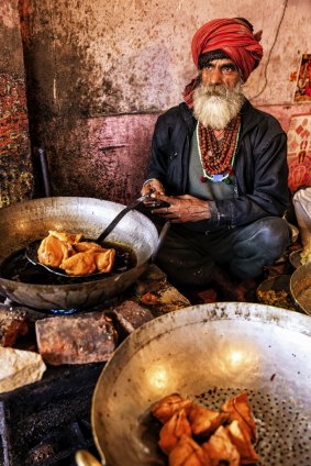 A street vendor prepares food in Jaipur.



Indian street vendor preparing food, Jaipur, India - Stock image

India, Cooking, Indian Culture, Indian Ethnicity, City Life