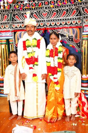Ganesh and Ranjini with Ranjini's older two sons at their 2011 wedding.