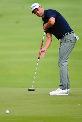Sticking with it: Adam Scott with his broomstick putter at the Australian PGA.