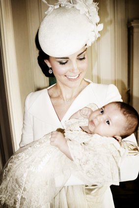 Catherine, Duchess of Cambridge and her daughter Princess Charlotte of Cambridge pose for a  in the Drawing Room at Sandringham House after the christening.