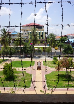 Toul Sleng through barbed wire.
