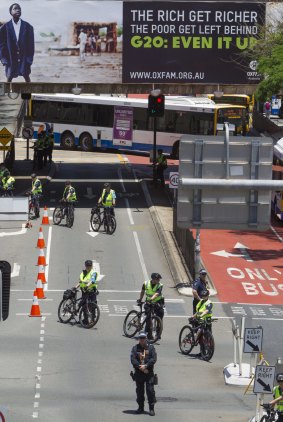 Police block the road in Brisbane's CBD during protests ahead of the 2014 G20 leaders summit.