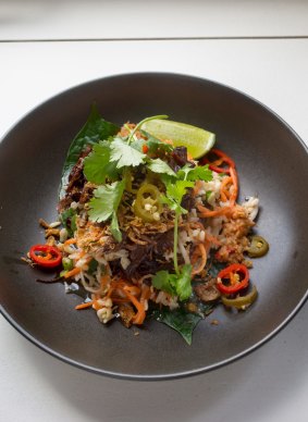 Lemongrass beef with betel leaf, brown rice, pickled chilli, nahm jim and vietnamese mint.