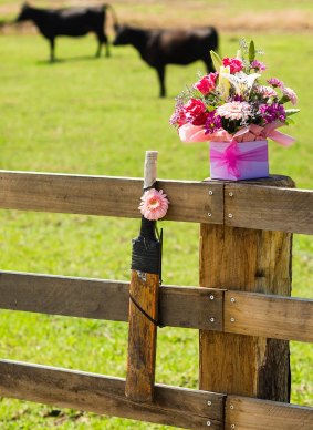 Flowers and a cricket bat are left outside Phillip Hughes property in Macksville, his hometown. 