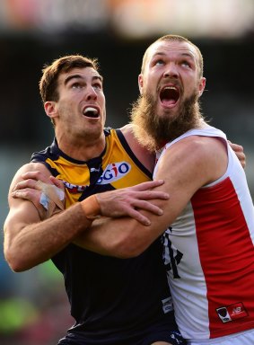 Scott Lycett and big Demon Max Gawn jostle for position.