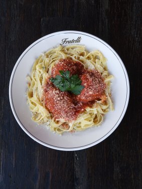 Tagliatelle with pork and beef meatballs.