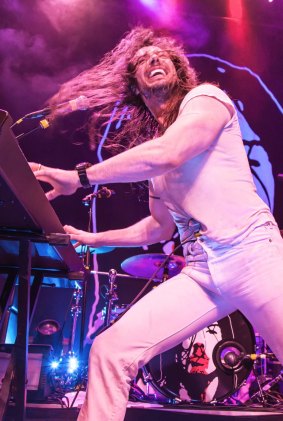 Andrew WK on stage.