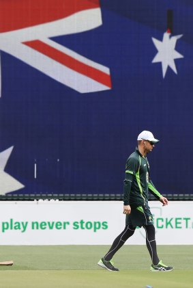 Taking it slowly: Michael Clarke on one of his laps of Adelaide Oval.