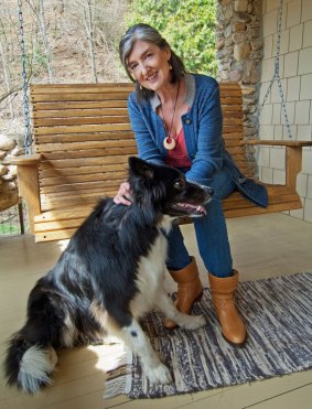 Barbara Kingsolver at home with her dog Walker.