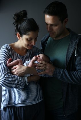 Libby Nathan and husband Jeremy with their day-old baby son.