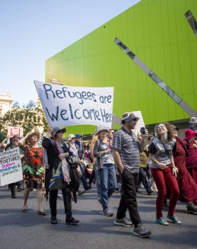 Crowds marched through the streets to protest for those in offshore detention to be welcomed to Australia.