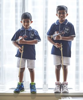 Smarties: Isaac and Jeremiah Bhalsod are part of the rapidly growing number of child members of Mensa. Of the 200 members who attended the Melbourne conference, 23 were aged less than 12. 